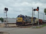 CSXT 8636 WB on the BNSF, passing the station sign